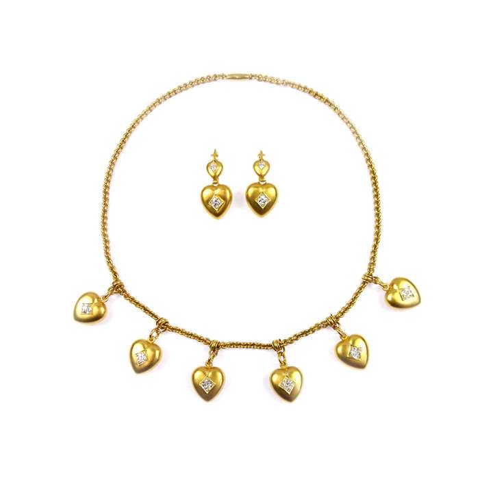 19th century gold and diamond heart locket fringe necklace and pendant earrings en suite